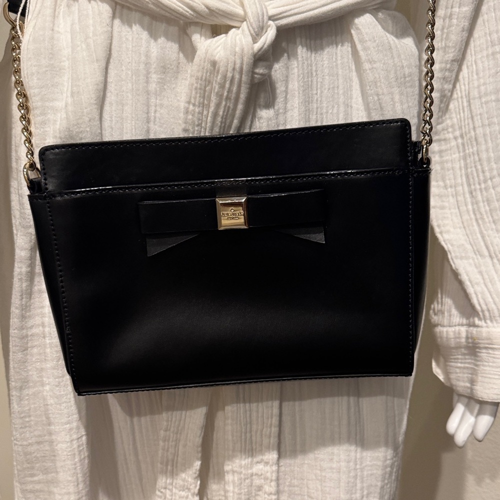 Elegant Black Crossbody Bag with Gold Accents